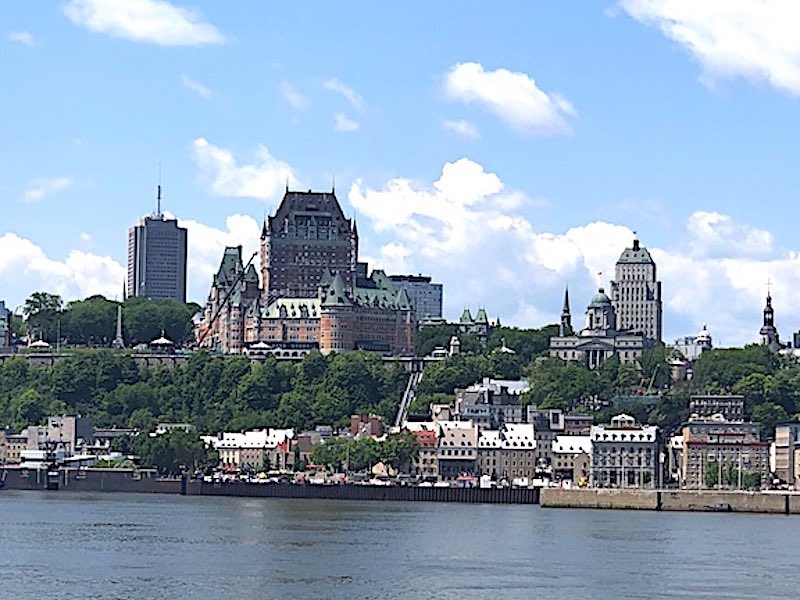A view of the skyline of Old Quebec City with the Fairmont Le Château Frontenac in the center from the St. Lawrence River