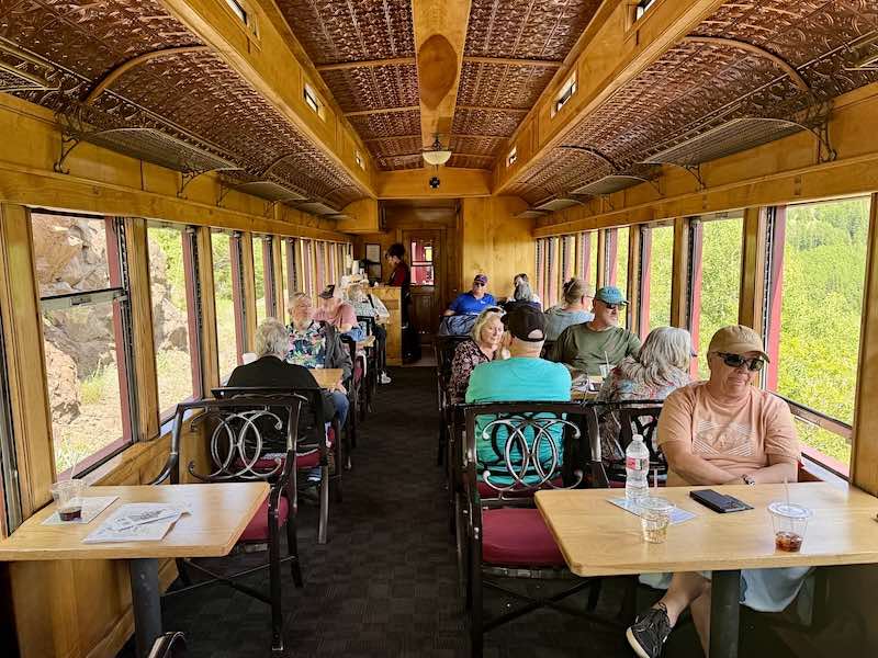 The Deluxe passenger car with tables on the Toltec and Cumbres Scenic Railroad