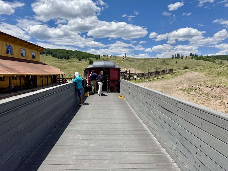 An open-air viewing platform car on the Toltec and Cumbres Scenic Railroad