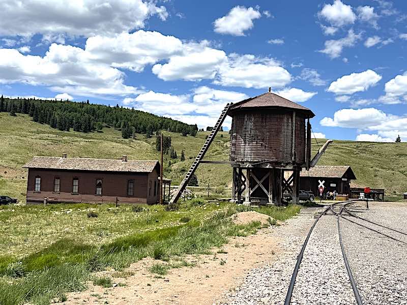 A water tower and historic buildings at Ozier Station