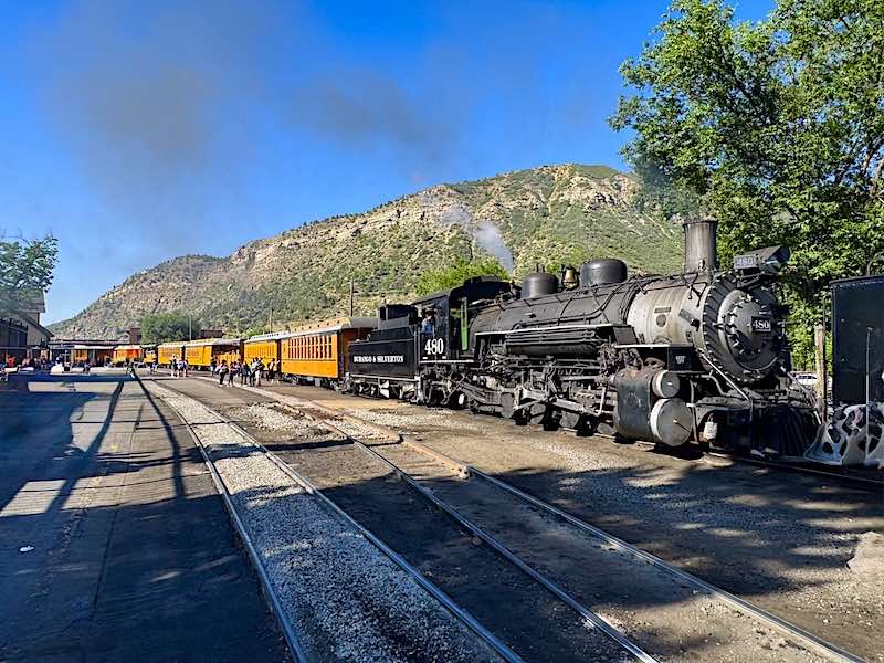 Steam Engines 476, 480, and the connected coaches preparing for the journey to Silverton, Colorado