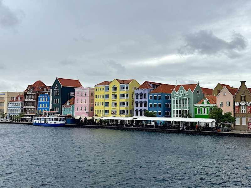 The brightly painted waterfront buildings of the Handelskade