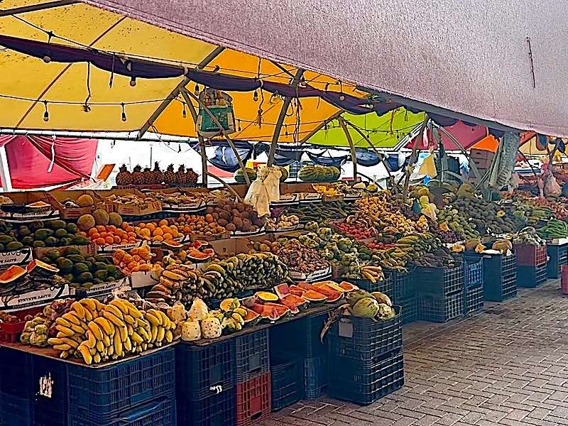 Fresh fruits and vegetables for sale at the Floating Market located on Sha Caprilleskade