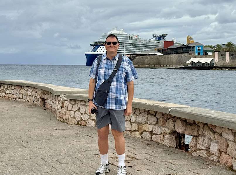 The author standing in front of Sint Anna Bay and Rif Fort