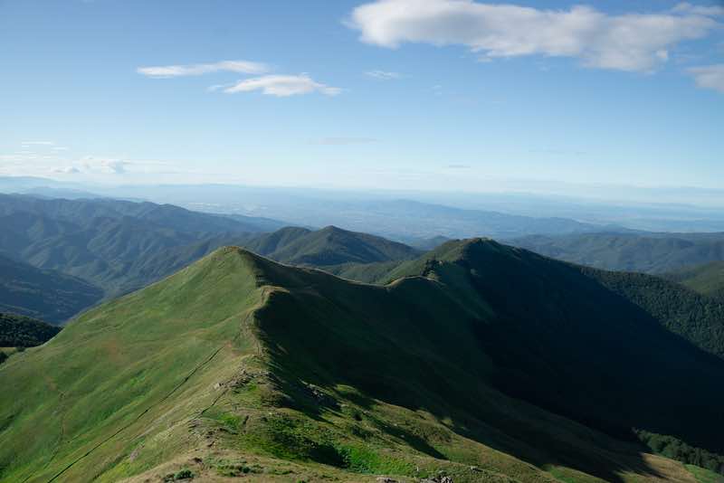 A narrow hiking path following the Apennine ridge near Corno alle Scale.